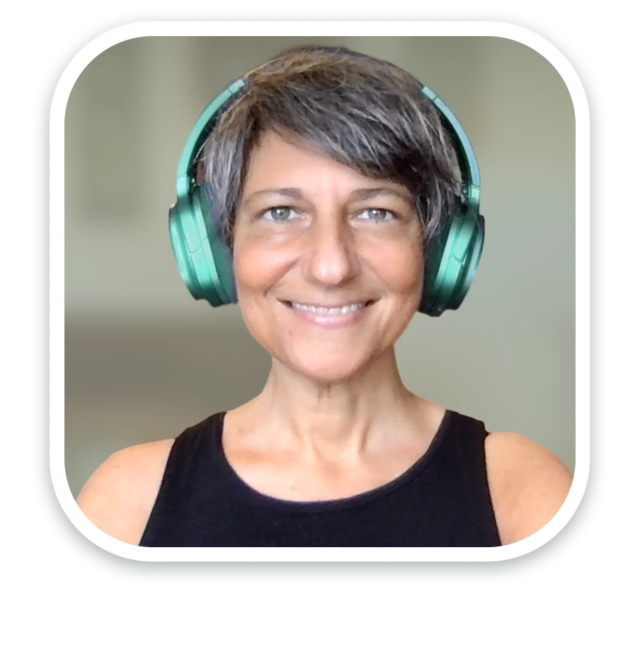 Lisa today, smiling, wearing headphones